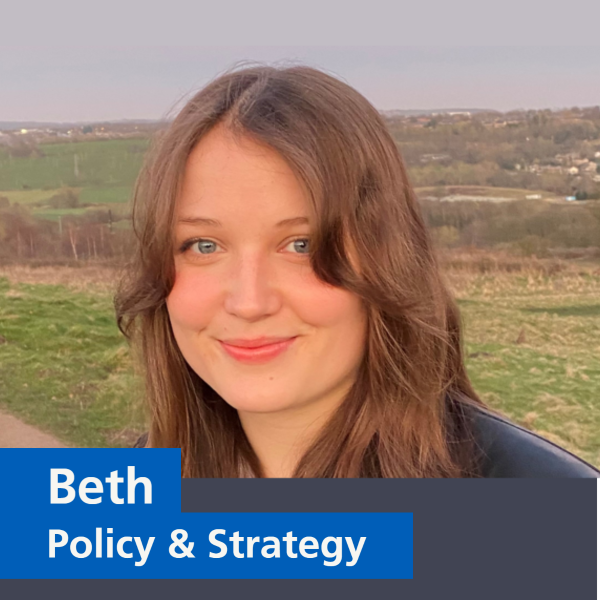 Image of a person smiling at the camera with text that says 'Beth, Policy & Strategy'