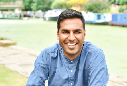 Image of a person smiling at the camera